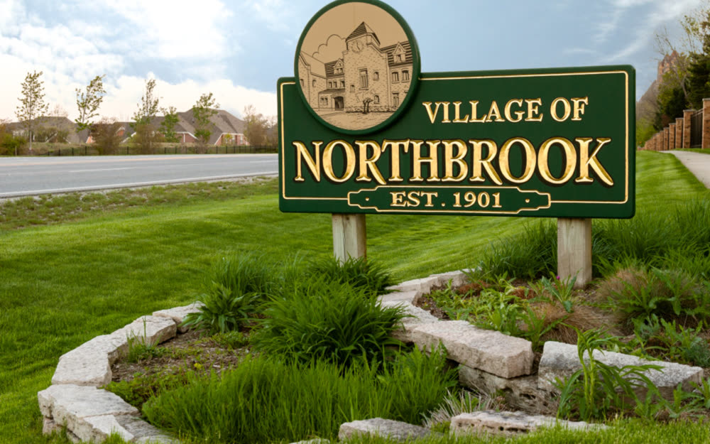 The Village of Northbrook sign on Waukegan Road, near the Grand Oaks Northbrook office